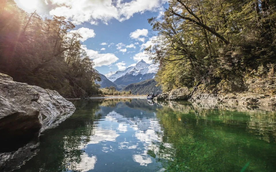 Pristine glaceir fed rivers flanked by ancient beech forest 