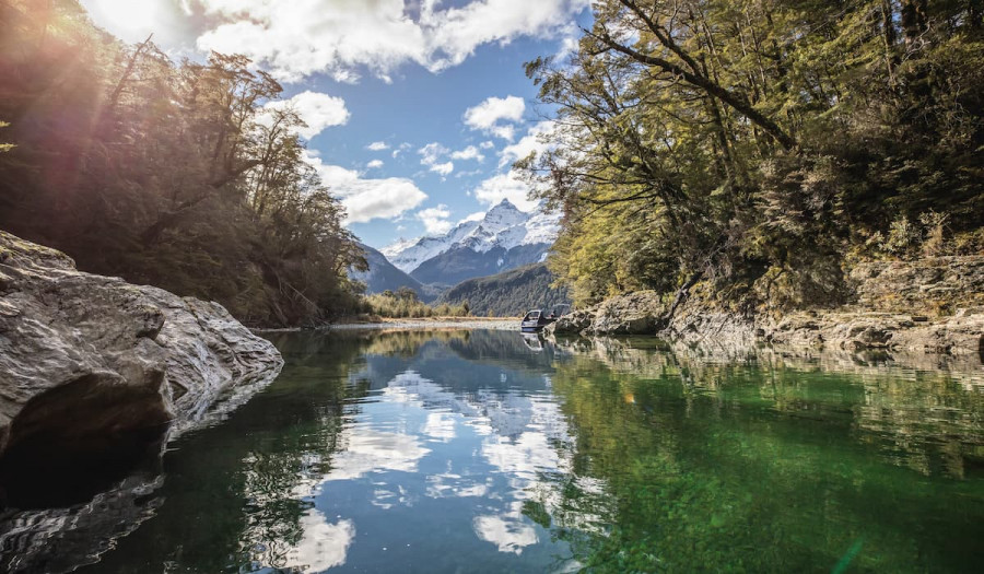 Pristine glaceir fed rivers flanked by ancient beech forest 